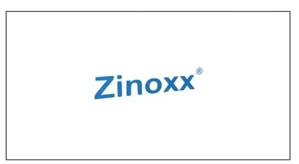 Niebieski napis Zinoxx z zarejestrowanym znakiem towarowym.